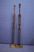 A PAIR OF CARVED TRIBAL STYLE STICK MEN