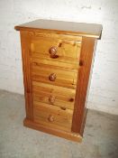 A PINE CHEST OF DRAWERS