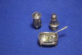 TWO SILVER PEPPERETTES AND A MUSTARD POT