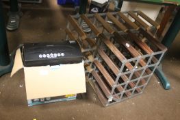 A PAPER SHREDDER AND TWO WINE RACKS
