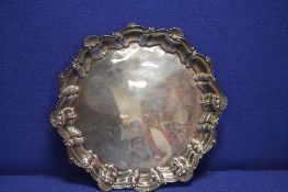 A WHITE METAL TRAY