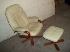 A LEATHER SWVEL RECLINING CHAIR