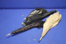 FOUR VINTAGE PARASOLS