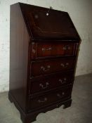 A LEATHER INLAID LADIES WRITING BUREAU