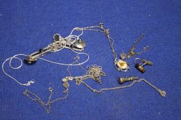A QUANTITY OF SILVER AND WHITE METAL JEWELLERY TO INCLUDE NECKLACES, EARINGS ETC