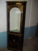 AN ORIENTAL STYLE CORNER CABINET