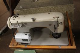 A CASED SEWNG MACHINE