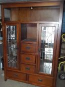 A MODERN OAK DISPLAY CABINET WITH LEADED GLASS
