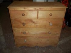 A PINE CHEST OF DRAWERS