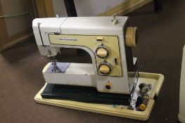 A CASED FRISTER AND ROSSMANN SEWING MACHINE