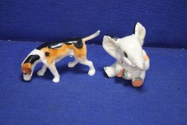 A WEDGWOOD ELEPHANT TOGETHER WITH A DOG