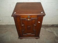 AN ANTIQUE STORAGE CABINET