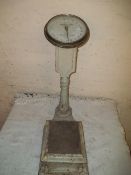 A SET OF VINTAGE WEIGHING SCALES