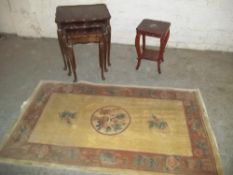 THREE ITEMS TO INCLUDE A NEST OF TABLES, A SIDE TABLE AND A RUG