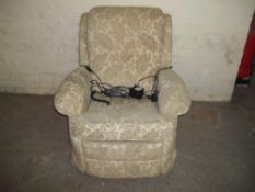 A FABRIC RISE AND RECLINE CHAIR