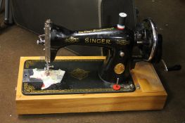 A CASED SINGER SEWING MACHINE