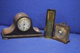 TWO MANTLE CLOCKS TOGETHER WITH A BRASS TRENCHART SHELL CASE