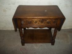 AN OAK DROPLEAF TABLE