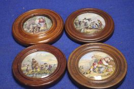 FOUR PAINTED POT LIDS