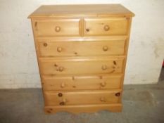 A MODERN PINE CHEST OF DRAWERS
