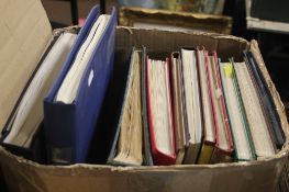 A TRAY OF ASSORTED STAMPS IN ALBUMS MAINLY GERMAN INTEREST (TRAY NOT INCLUDED)