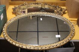 TWO OVAL MIRRORS