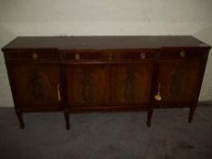 A SAPELE COSS BANDED BREAKFRONT SIDEBOARD