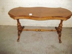 AN ANTIQUE SERPENTINE TWIN PEDESTAL TABLE