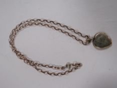 A 9KT ITALIAN GOLD BELCHER CHAIN - APPROX 2.8g, TOGETHER WITH A YELLOW METAL LOCKET