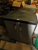 A PLASTIC GARDEN STORAGE BOX