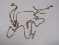 A HALLMARKED 9CT GOLD T-BAR BELCHER CHAIN TOGETHER WITH A BROKEN YELLOW METAL CHAIN, APPROX COMBINED