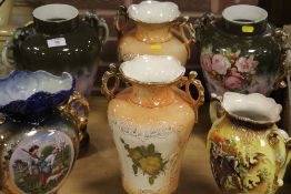 A COLLECTION OF SIX EARLY TO MID 20TH CENTURY DECORATIVE VASES, COMPRISING TWO PAIRS AND TWO