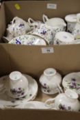TWO TRAYS OF TEAWARE COMPRISING COALPORT PAGEANT PATTERN AND CROWN STAFFORDSHIRE FLORAL TEAWARE
