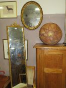 A VINTAGE GILT RECTANGULAR MIRROR, OVAL MIRROR AND EASTERN STOOL (3)
