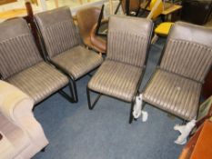 A SET OF FOUR MODERN LEATHER DINING CHAIRS