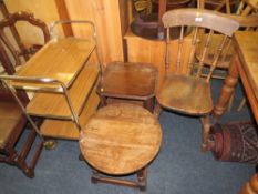 A TRADITIONAL ELM KITCHEN CHAIR, TWO OAK OCCASIONAL TABLES AND A TROLLEY (4)