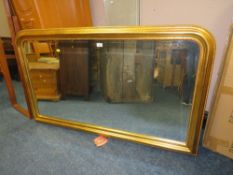 A LARGE MODERN GILT ARCHED OVERMANTLE MIRROR H-85 W-142 CM