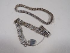 A SILVER GATE BRACELET TOGETHER WITH A SILVER CZ SET TENNIS BRACELET (20