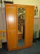 A MODERN TRIPLE WARDROBE