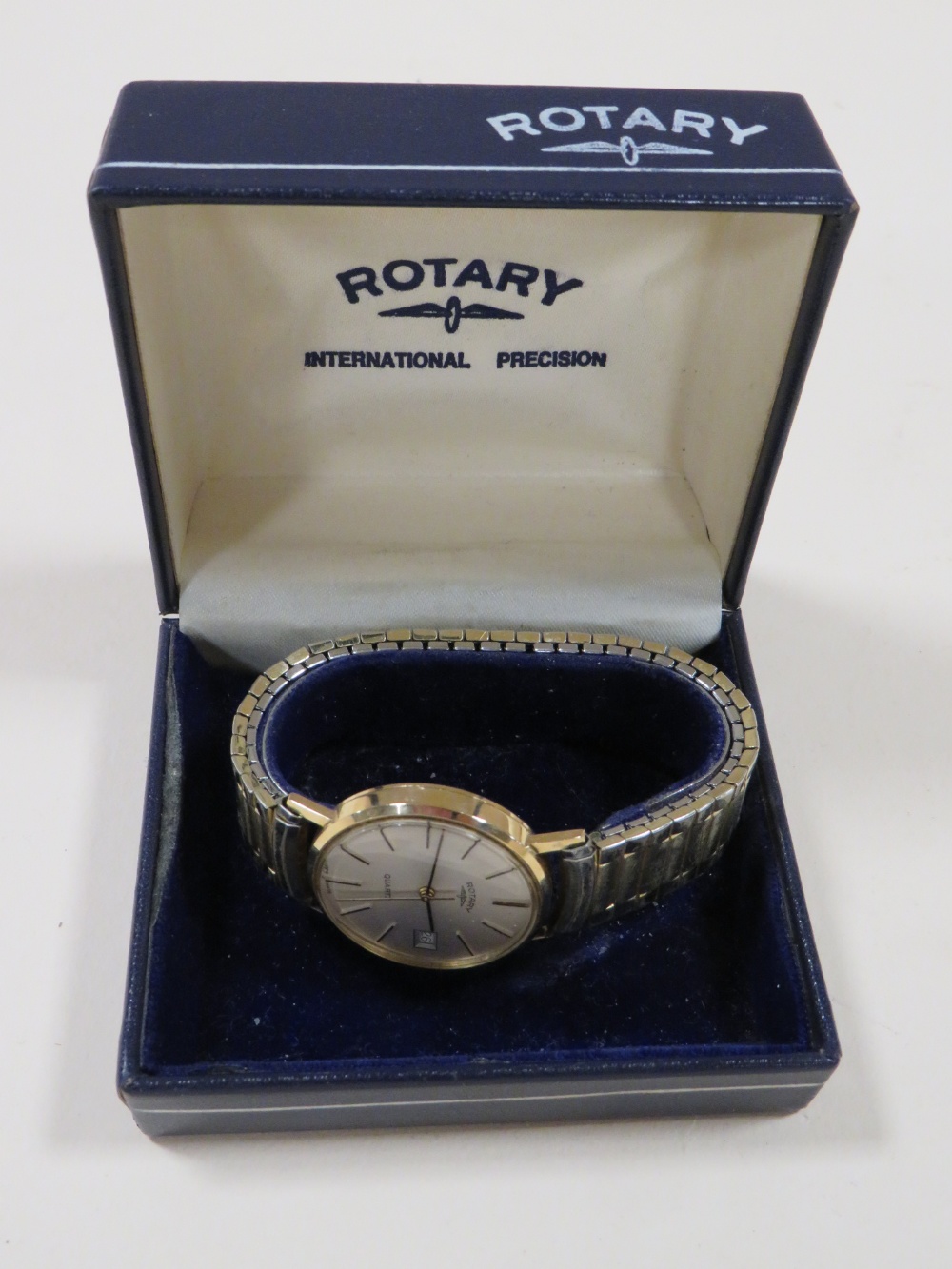 A BOXED ROTARY QUARTZ WRISTWATCH WITH ENGRAVED INSCRIPTION TO REVERSE