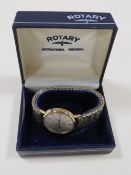A BOXED ROTARY QUARTZ WRISTWATCH WITH ENGRAVED INSCRIPTION TO REVERSE