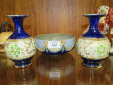 A PAIR OF ROYAL DOULTON STONEWARE VASES TOGETHER WITH A BOWL - THE BOWL HAVING DAMAGES