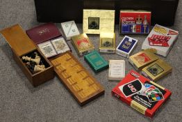 A BOX OF ASSORTED CIGARETTE CARDS IN ALBUMS ETC TOGETHER WITH A BOX OF ASSORTED PLAYING CARDS, GLASS