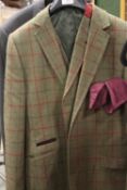 A BROOK TAVERNER TWEED WAISTCOAT AND JACKET SIZE 40R TOGETHER WITH A VINTAGE SKOPES SUIT