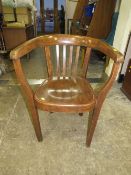 A VINTAGE OFFICE ARMCHAIR