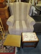 A MODERN UPHOLSTERED STRIPED ARMCHAIR