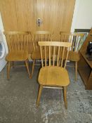 A SET OF FOUR MODERN OAK STICKBACK DINING CHAIRS