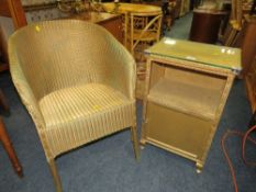 A GOLD LLOYD LOOM CHAIR AND A WICKER BEDSIDE CABINET (2)