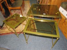 A NEST OF BRASS AND GLASS TABLES W-65 CM