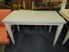 A MODERN DINING TABLE